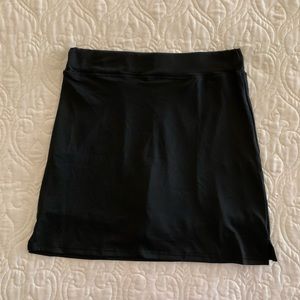 New without tags never worn sport skirt with shorts attached.
